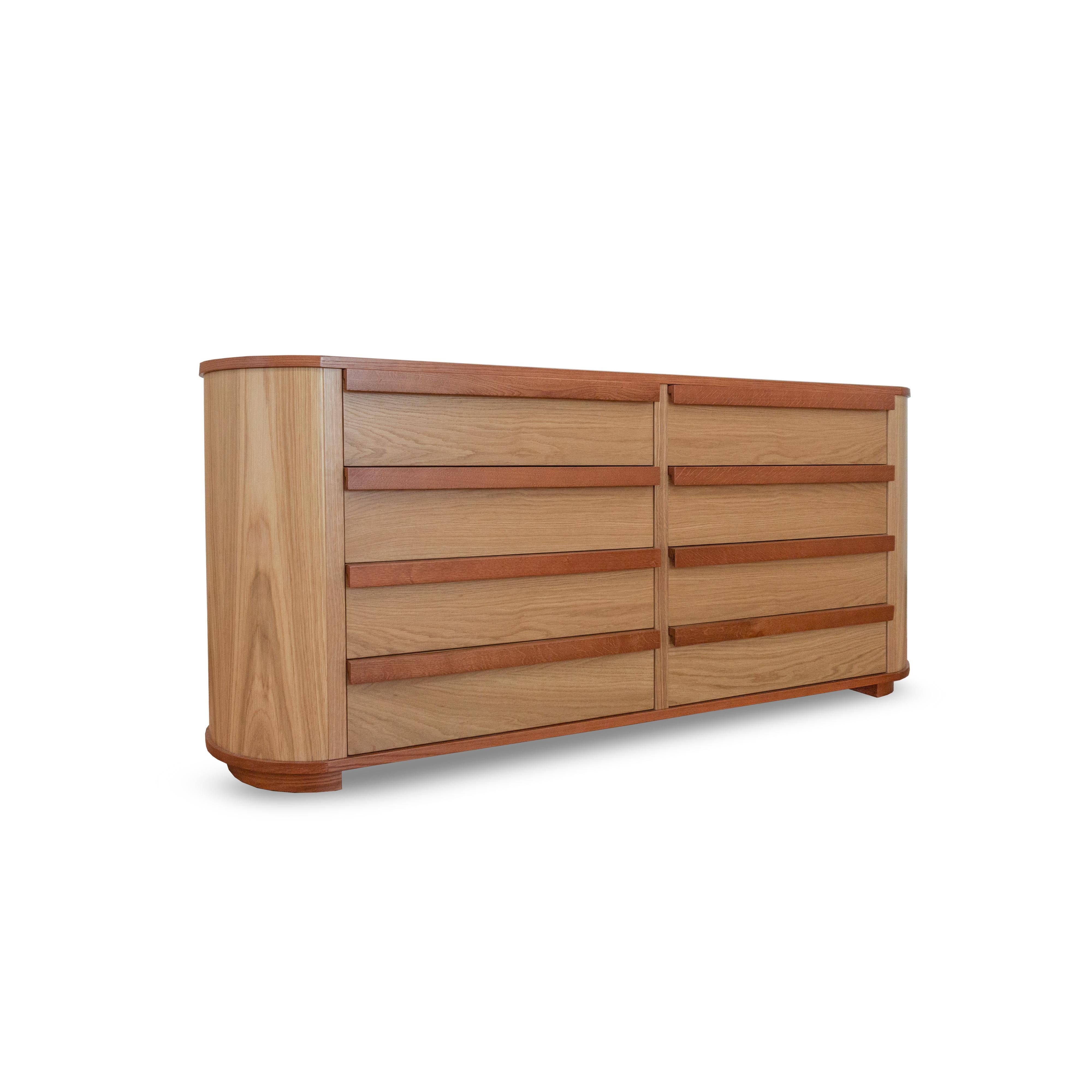 Nami Dresser - Oak Veneer Chest of Drawers with Interior Jewelry Storage

The Nami Chest of Drawers is a beautifully rounded piece that combines form and function. Crafted from oak veneer, its subtle curves and clean lines offer a sense of quiet