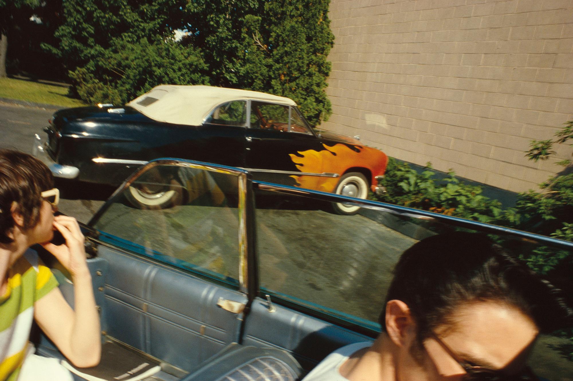 Nan Goldin Figurative Photograph - Flaming car, Salisbury Beach, NH