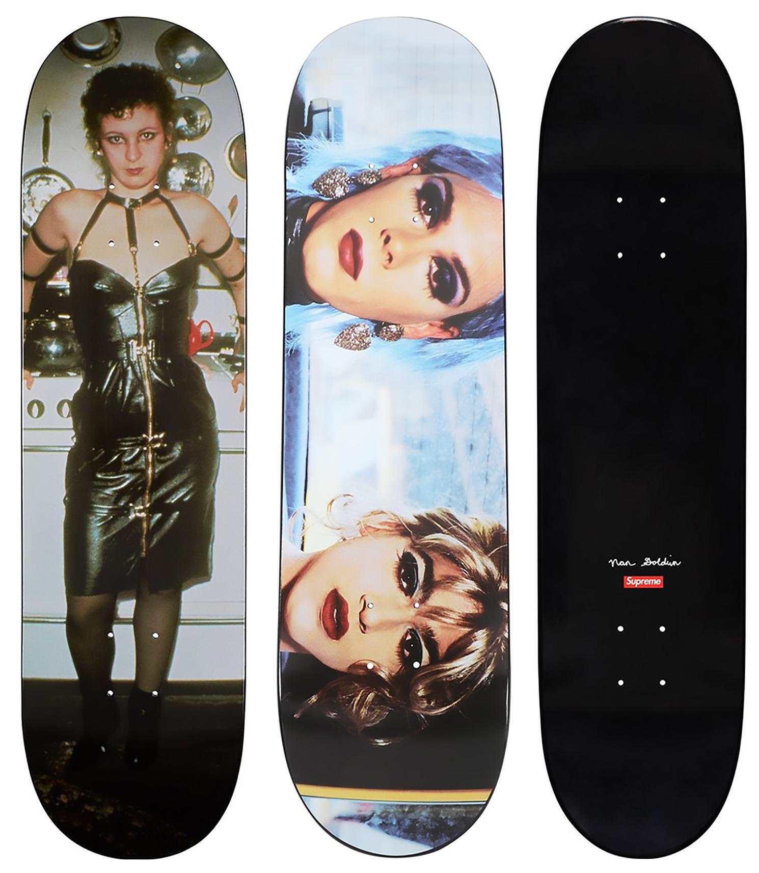 Nan Goldin Supreme Skateboard Decks, 2018 (set of 2):
– Misty and Jimmy Paulette in a taxi, (NYC 1991)
– Nan as a Dominatrix (Cambridge MA 1978)

Set of 2 limited edition Nan Goldin skateboard published by Supreme New York in 2018 incorporating the