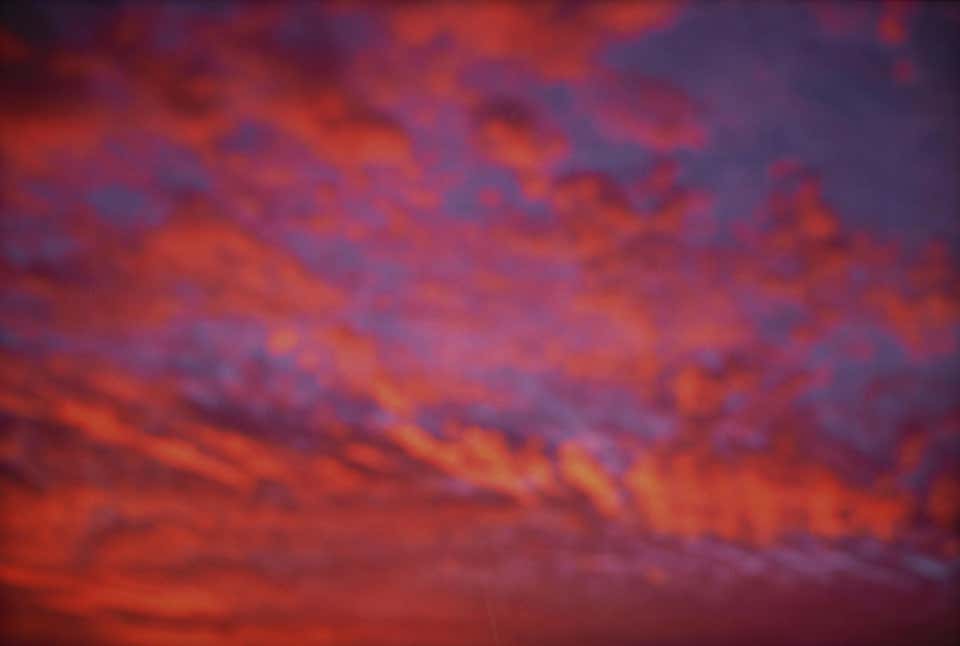 Pink sky from airplane