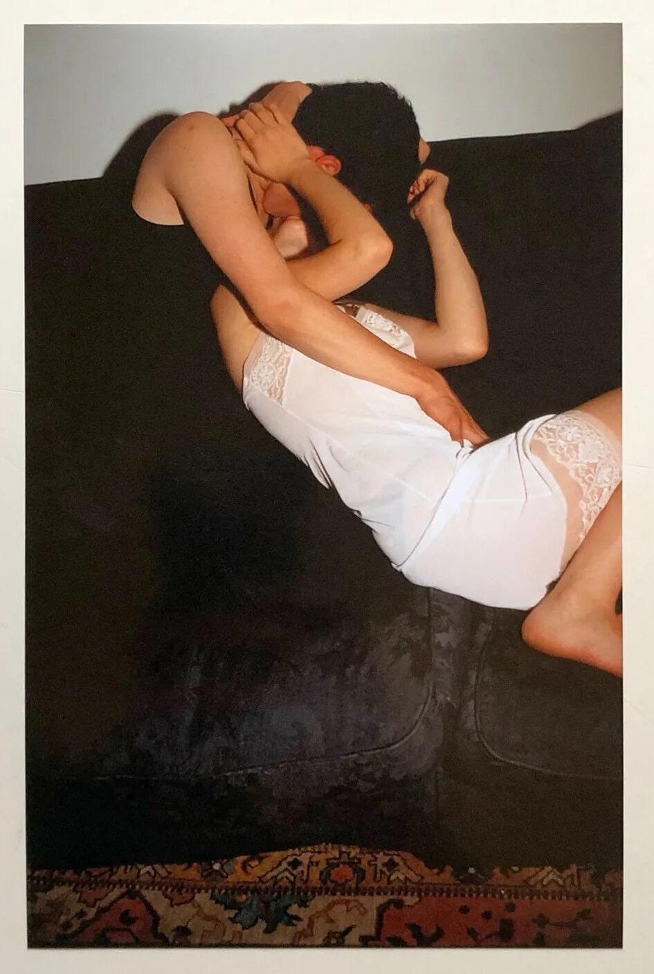 By Nan Goldin

Swan-Like Embrace, Paris (2001), printed later, 2021
C-Print on paper
8 x 5 1/8 inches
Signed verso (please see image 3)
From the 2021 timed release, published by Pain.
