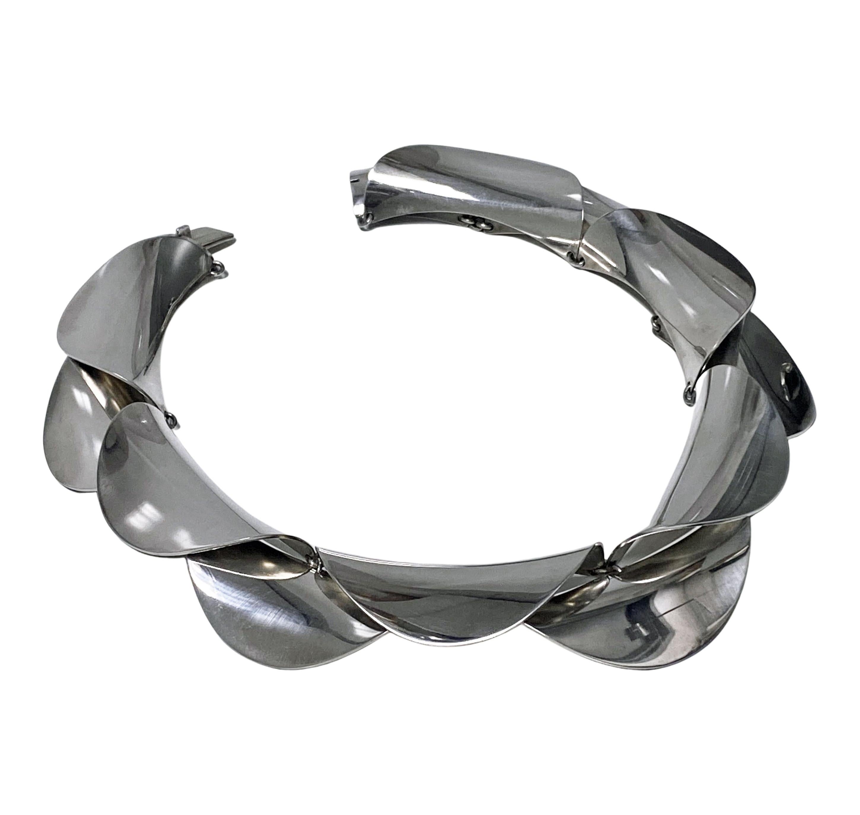Very rare Nanna Ditzel Georg Jensen Sterling collar Necklace, C.1965. Composed of a series of overlapping curved semi-circular panels Signed Georg Jensen and No. 129 with designer's mark NJ for Nanna and Jorgen Ditzel. Item Weight: 170 grams.