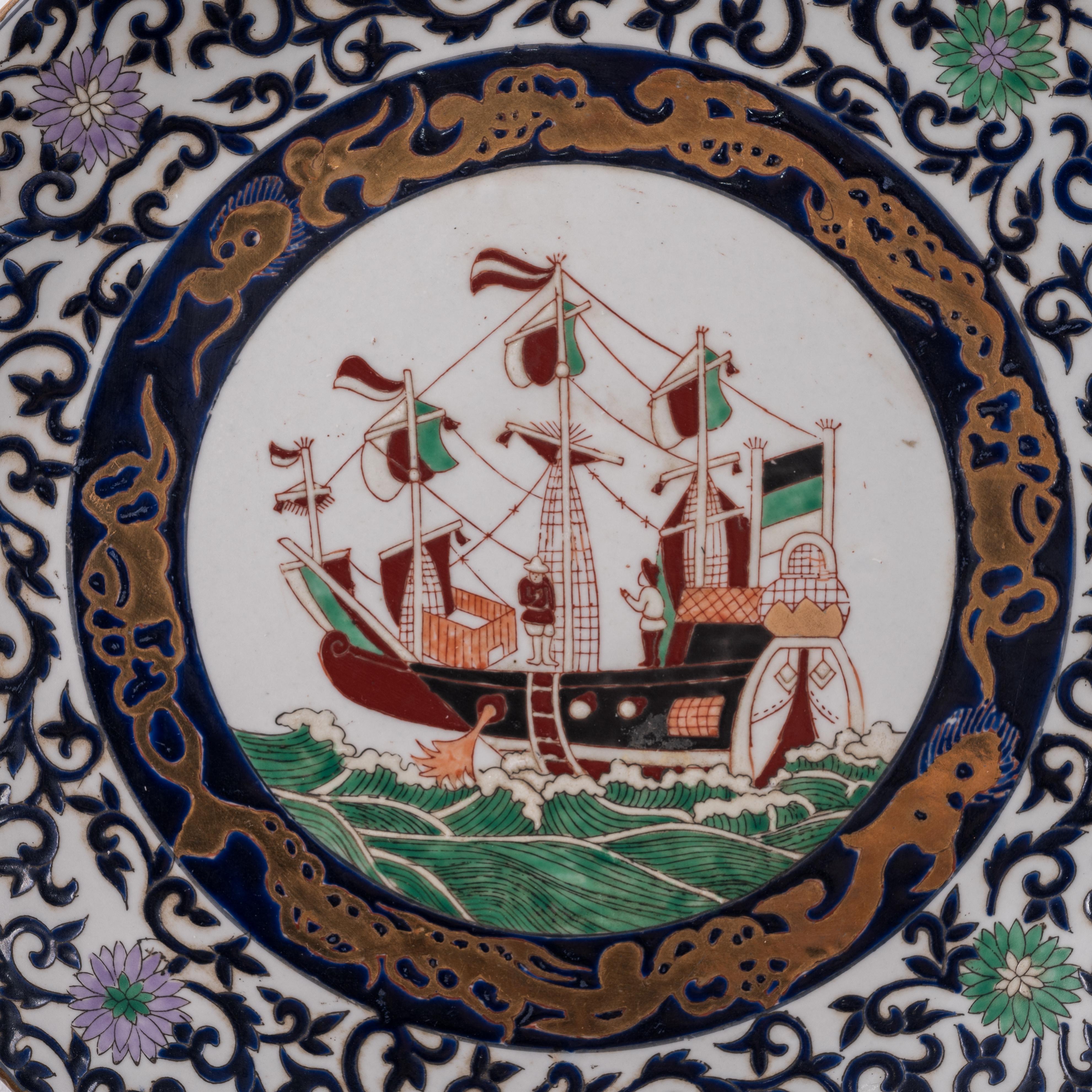 A pair of Nanban Black Ship Imari Chargers, late 19th century.

12 inches wide

