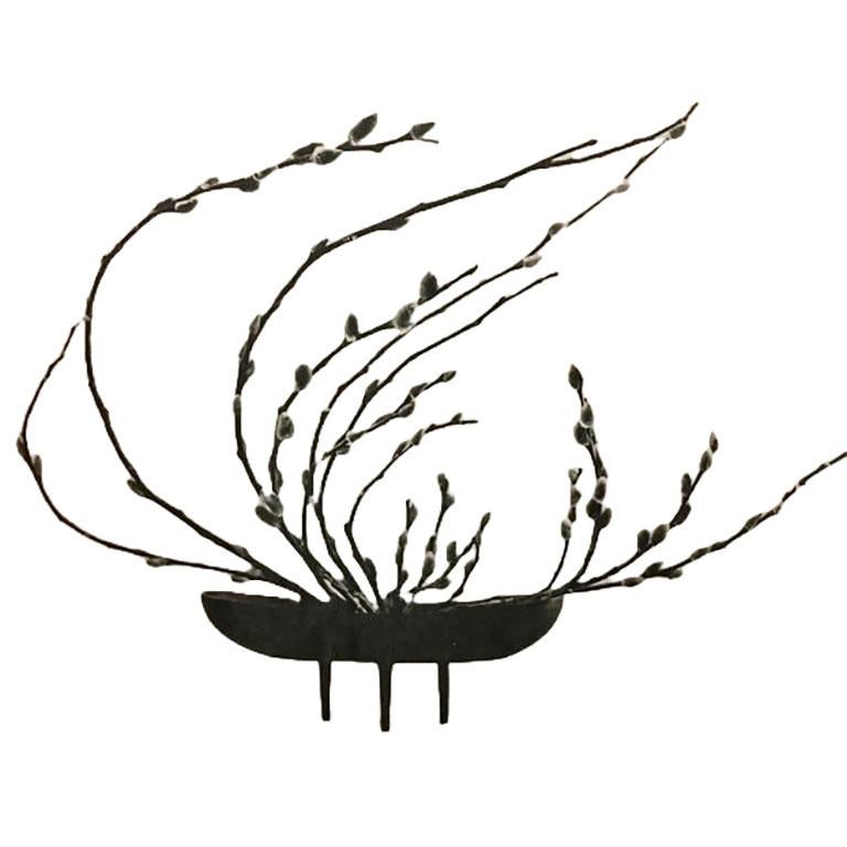Nanbu, Japan Cast Iron Ikebana Footed Vase / Planter ca 1950s/60s

Nanbu is an area of Japan that is famous for making quality cast iron products, including teapots and other housewares. This design is quite desirable as it shares a visual kinship