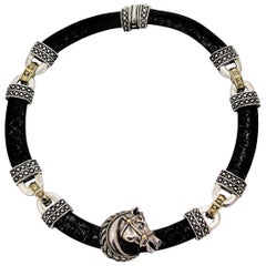 Nancy and David Silver, Gold and Black Leather Horse Necklace