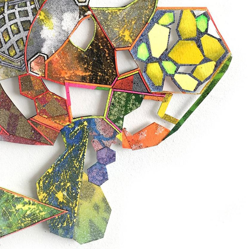 Nancy Baker creates paper constructions by combining digitally printed, hand and laser cut geometric forms loosely based on machine parts. Over time, the hardware imagery has evolved into an obsessive, jewel-laden structure, that some have described