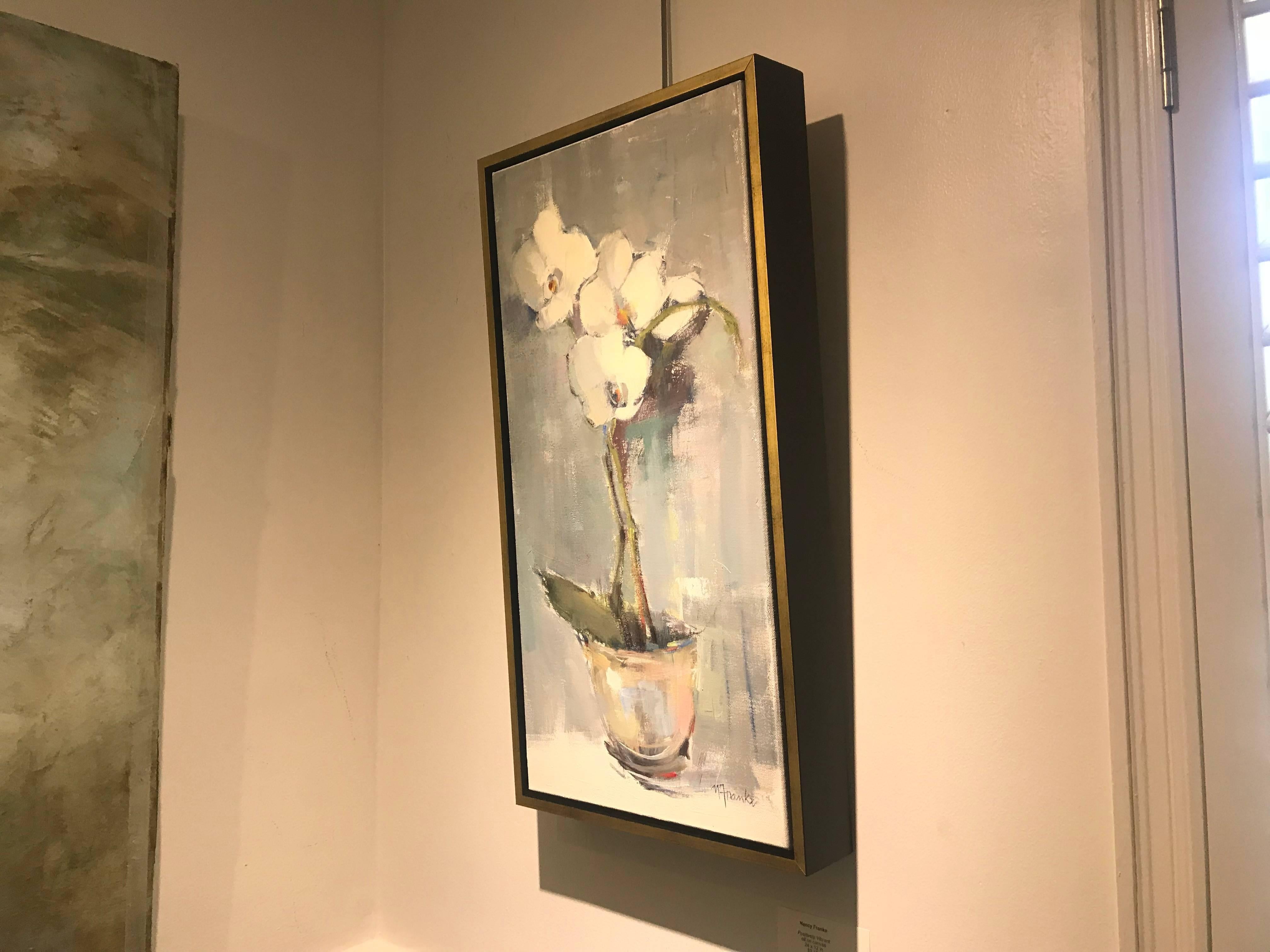 'Positively Vibrant' is an Impressionist oil on canvas floral painting of vertical format, created by American artist Nancy Franke in 2018. This still-life painting depicts a graceful bouquet of white orchids placed in front of a light green