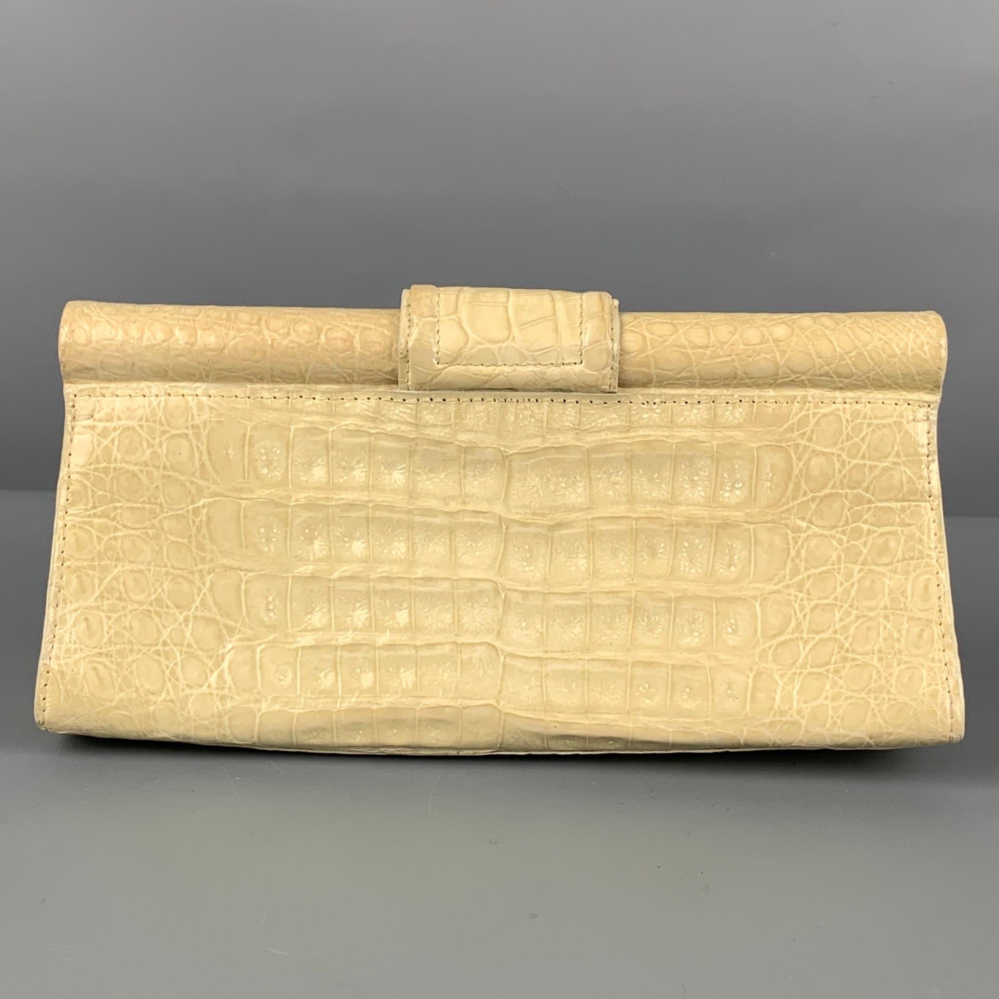 beige leather clutch