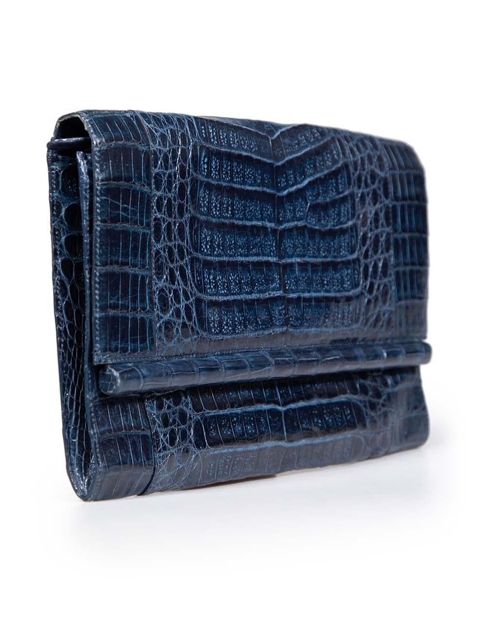 CONDITION is Very good. Minimal wear to the clutch is evident. Small scratches to the flap, bottom right, rear top, rear centre and internal flap. Light discolouration to the flap sides, rear top-right, rear internal pocket and internal rear