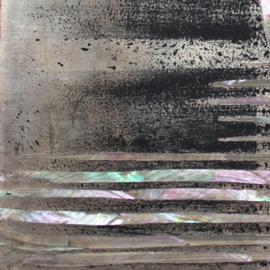 Nancy Lorenz is renowned for her use of materials, which range from burlap, jute, and clay, to the most luxurious mother of pearl and gold leaf. A direct influence of her time in Japan as an adolescent, Lorenz’s paintings have long presented