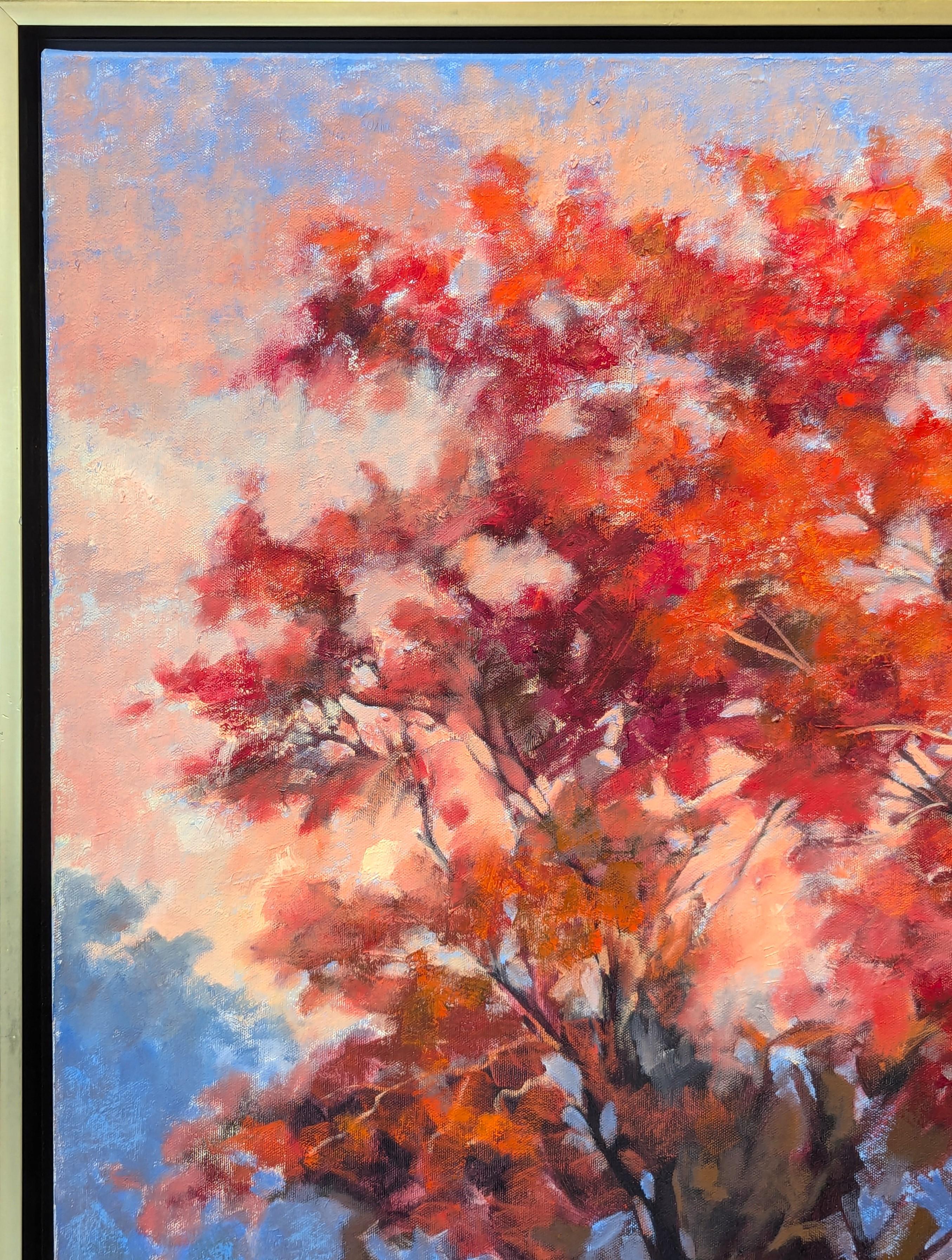Rich red and orange naturalistic landscape painting by Houston based artist Nancy Paris Pruden. The work features a serene path that winds through a forested area that is rich with vibrant fall foliage. Signed in the front lower left corner.