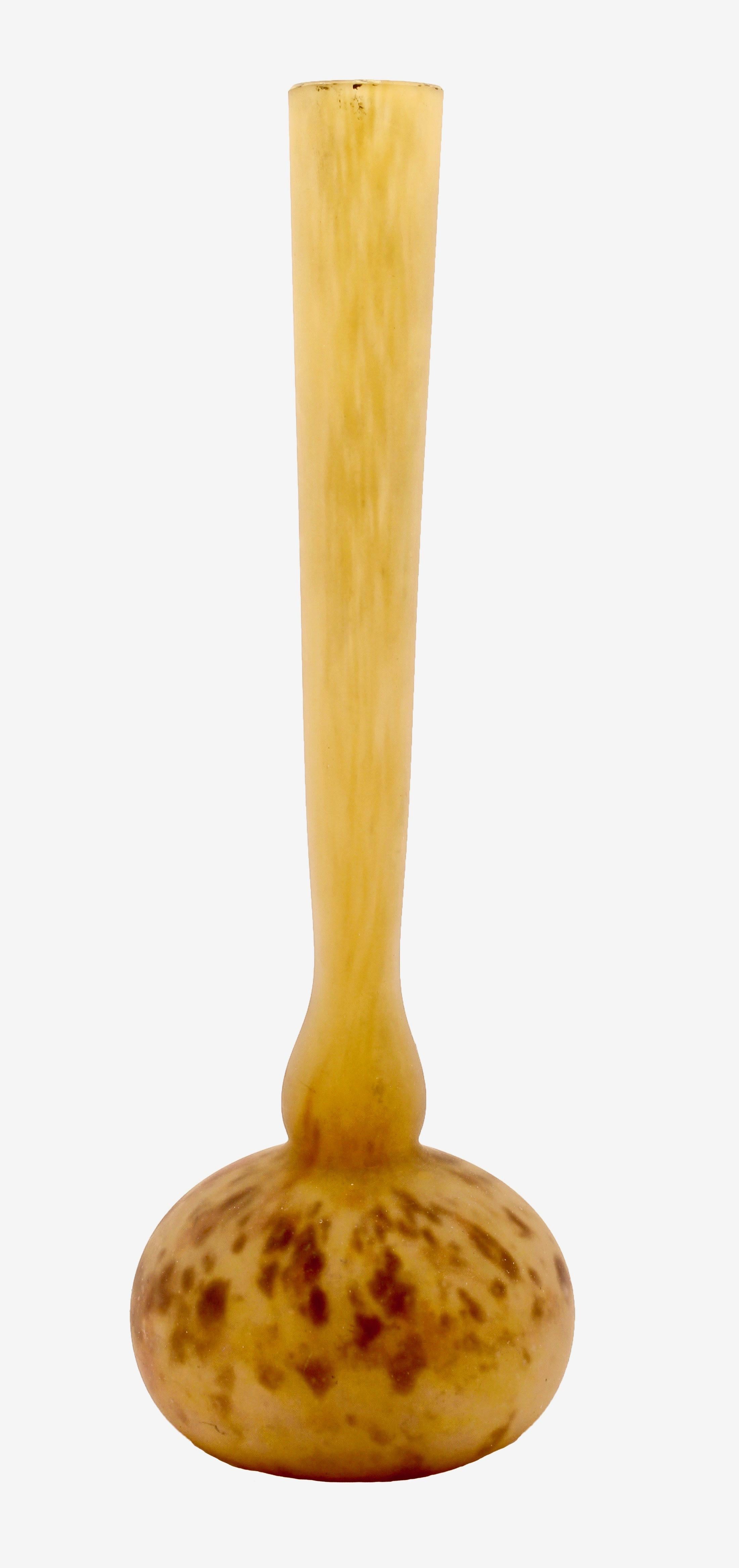 André Delatte (French, circa 1887-1953), an art glass vase, the mottled yellow and brown body with long slender neck,
Attributed to André Delatte.


    

    
   







   





























 