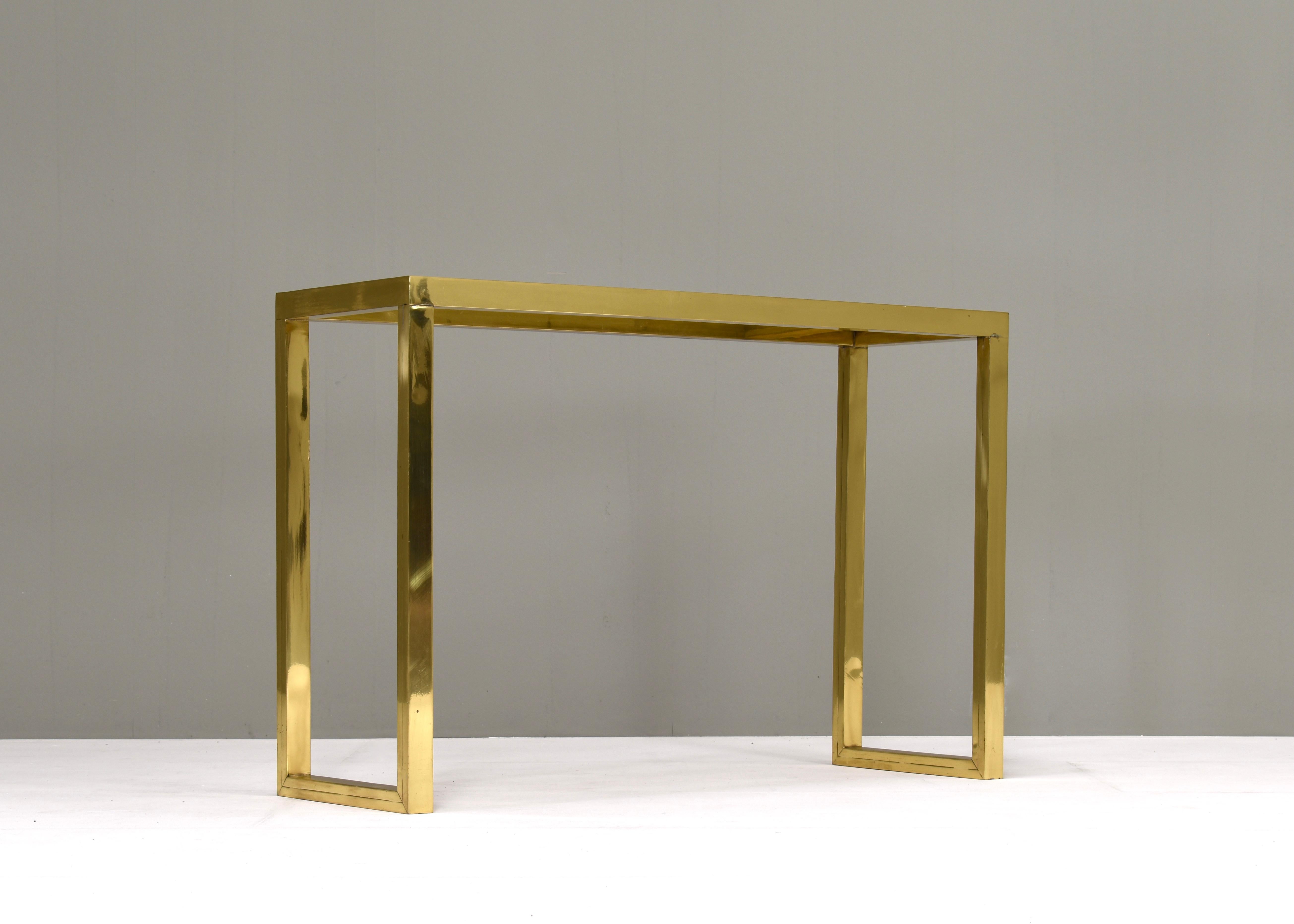 Brass console table attributed to Nanda Vigo – Italy, circa 1970.

Designer: Nanda Vigo attributed
Country: Italy
Model: console
Design Design period: 1970
Date of manufacturing: 1970’s
Size in cm: 110x37x73 cm.
Material: Brass /