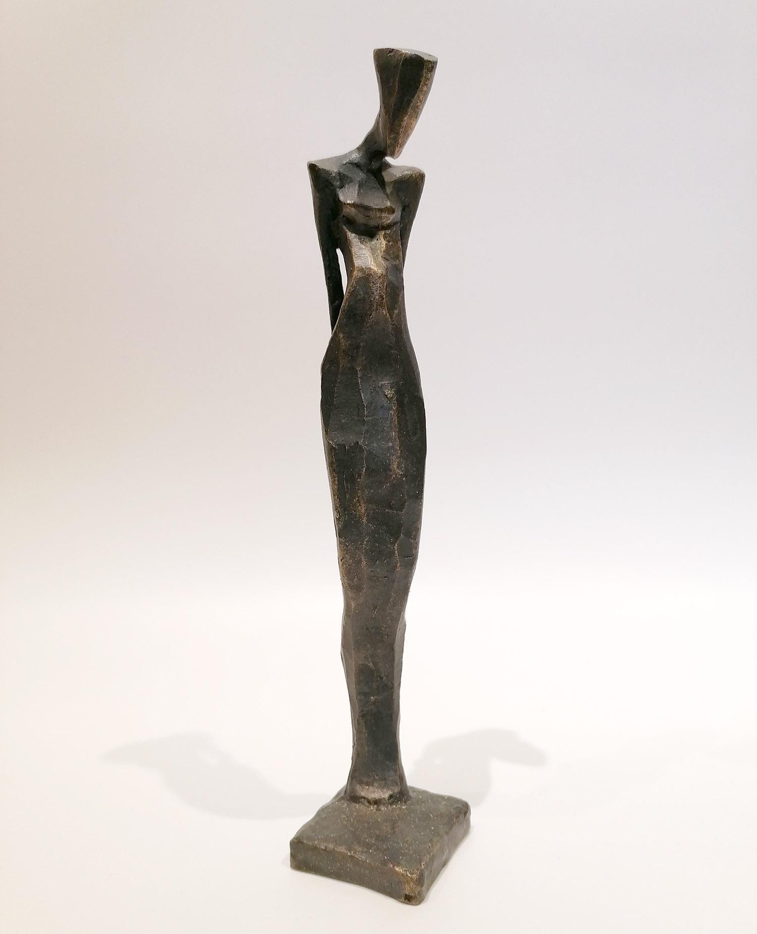 Annalies is a figurative bronze sculpture in a relaxed pose by Nando Kallweit.

Modelled on modern youthful postures but with a nod to the importance of heritage through the stylised Egyptian-influenced head. A lovely piece on its own or with a