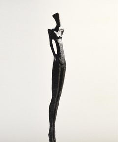 Antonio III by Nando Kallweit. Tall, elegant bronze sculpture of human figure.
