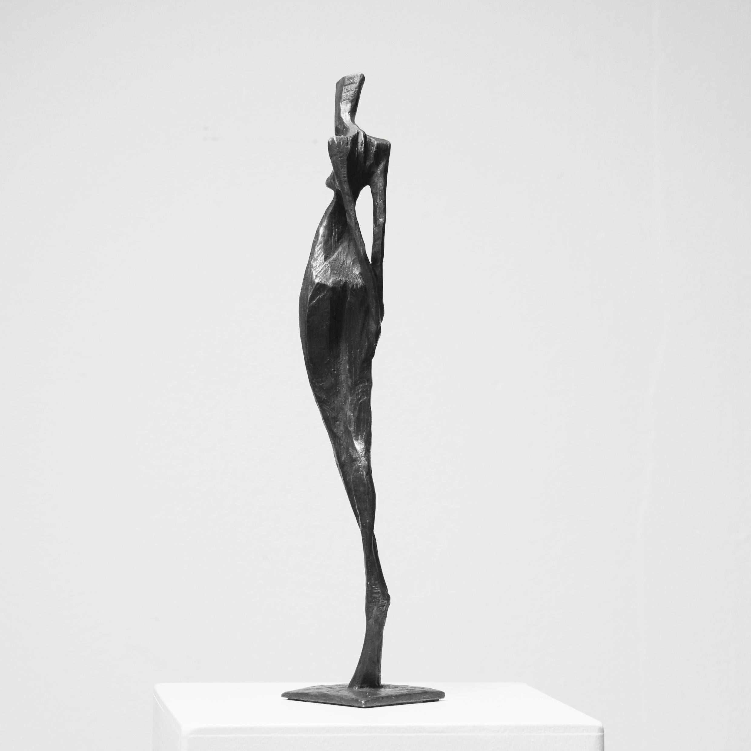 Artmeis is an elegant figurative bronze sculpture by Nando Kallweit.

Nando carves the marque for the body from a piece of oak using a small chain saw.  The marque is then used to make the cavity for a sand and clay cast bronze.  The figure