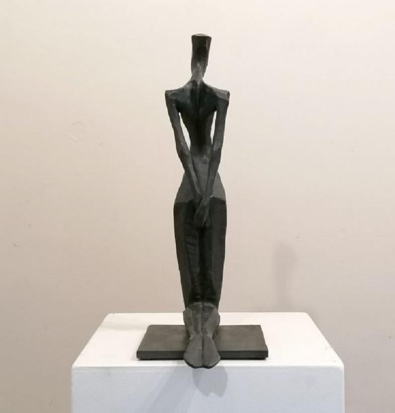 Carlotta is an elegant figurative bronze sculpture by Nando Kallweit.

Modelled on modern youthful postures but with a nod to the importance of heritage through the stylised Egyptian-influenced head.

Nando carved the marque for the body from a
