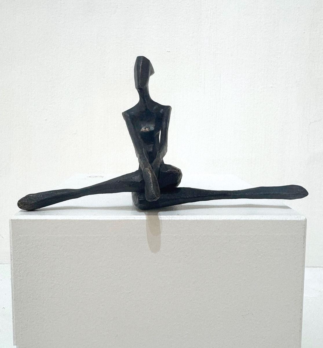 Cortney. By Nando Kallweit. Elegant bronze figurative sculpture of a female.