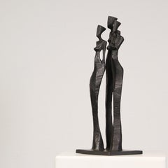 Donne V di Nando Kallweit.  Elegante scultura figurativa in bronzo di tre donne.
