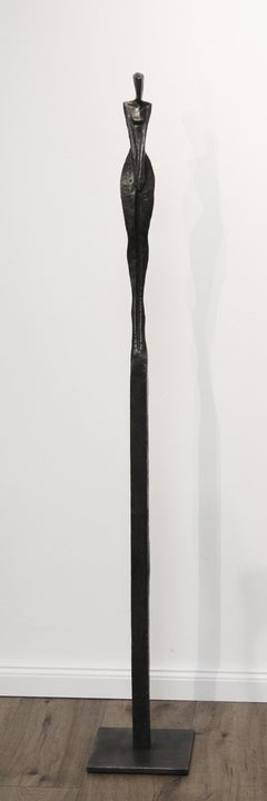 Eileen III by Nando Kallweit. Tall, elegant bronze sculpture of human figure.