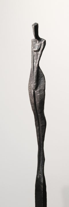 Eileen III by Nando Kallweit. Tall, elegant bronze sculpture of human figure.