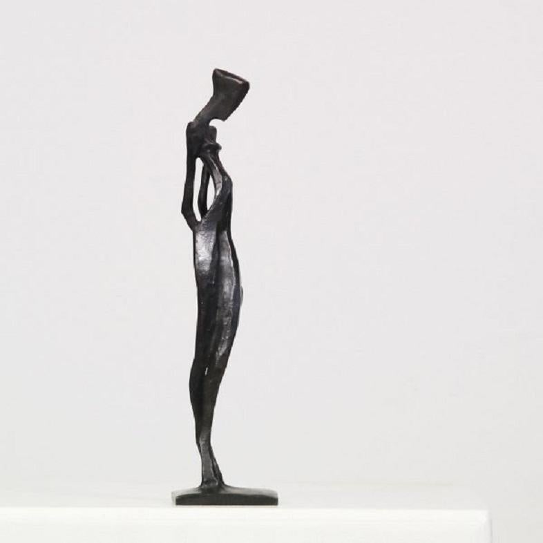 Emmy is an elegant figurative bronze sculpture by Nando Kallweit.

Modelled on modern youthful postures but with a nod to the importance of heritage through the stylised Egyptian-influenced head. 

The piece is produced in an edition of 25. Nando