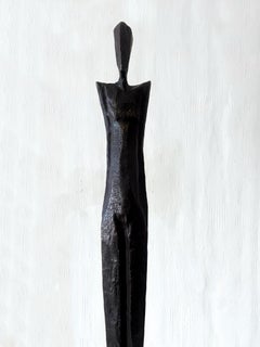 George by Nando Kallweit. Elegant bronze sculpture of a nude male human figure.