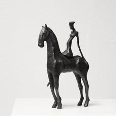 Giulia a Cavallo. By Nando Kallweit. Bronze sculpture of a woman and her horse