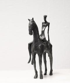 Giulia a Cavallo. Por Nando Kallweit. Escultura de bronce de una mujer y su caballo