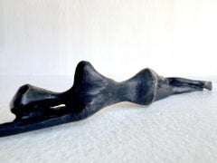 Iris. By Nando Kallweit. Elegant bronze figurative sculpture of a female.