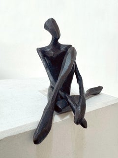 John. Por Nando Kallweit. Elegante escultura figurativa de bronce.
