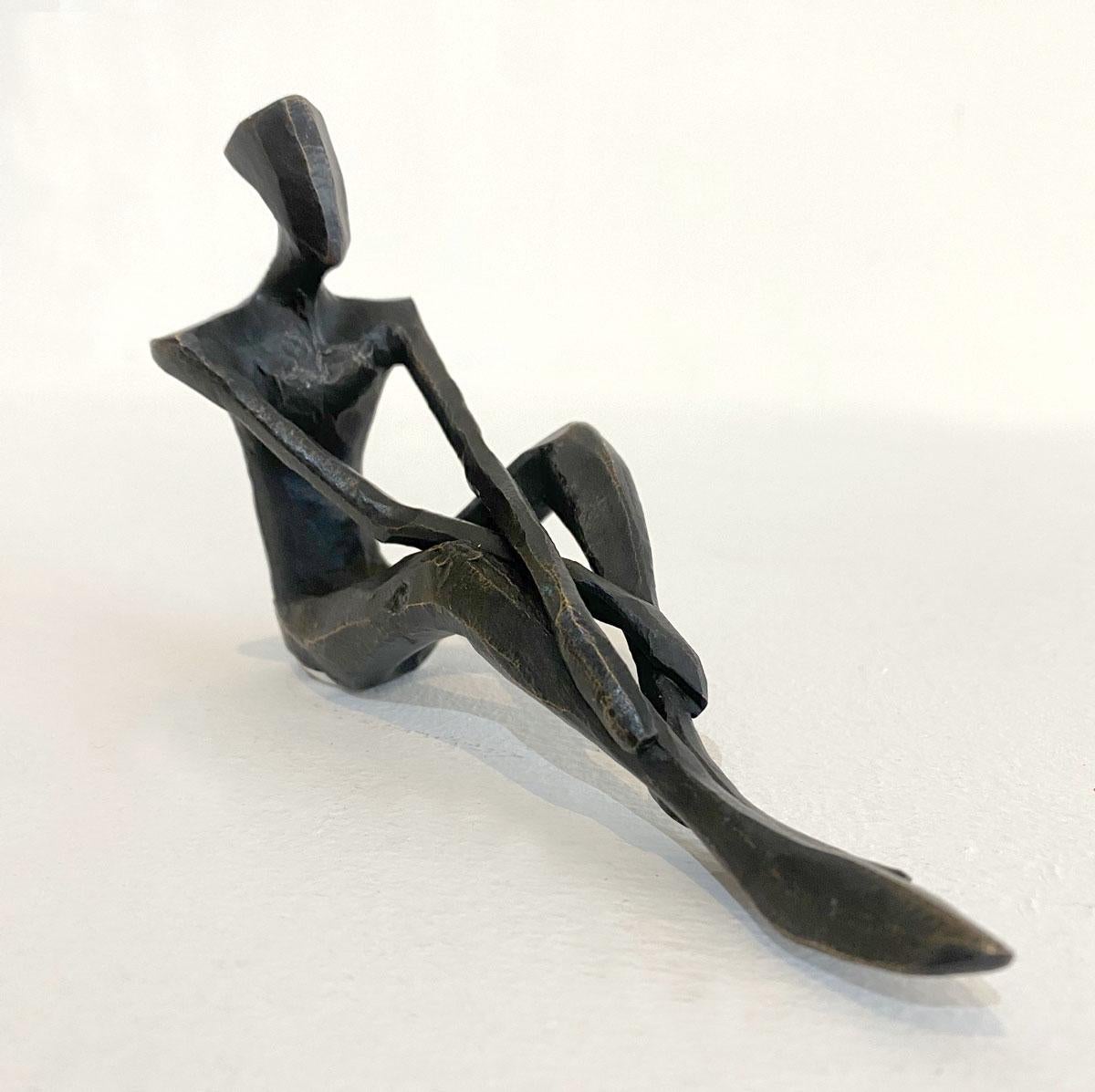 Jonas is a figurative bronze sculpture in a relaxed pose by Nando Kallweit.

Modelled on modern youthful postures but with a nod to the importance of heritage through the stylised Egyptian-influenced head. A lovely piece on its own or with a group
