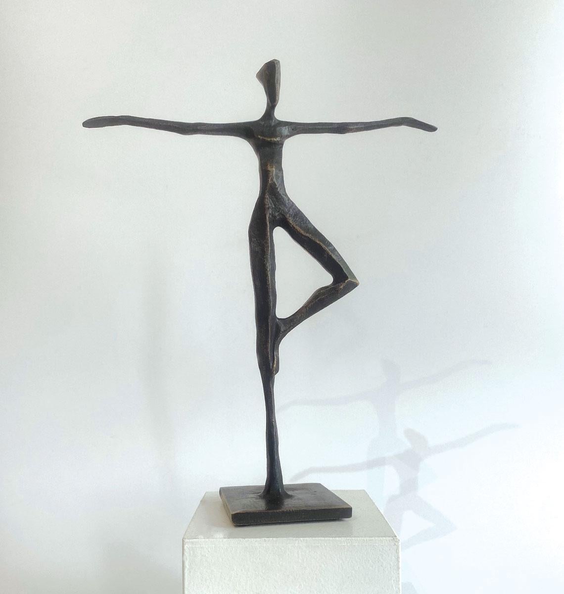 Maddison by Nando Kallweit. Elegant figurative bronze of a female in yoga pose
