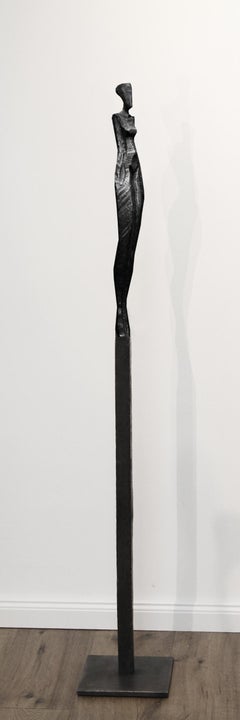 Marie III by Nando Kallweit. Tall, elegant bronze sculpture of human figure.