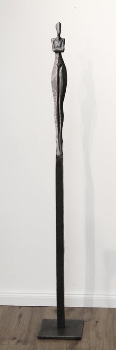 Marlene III by Nando Kallweit. Tall, elegant bronze sculpture of human figure.