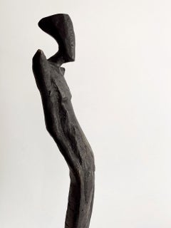 Michael by Nando Kallweit. Elegant figurative bronze sculpture of male form.