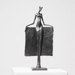 Neile by Nando Kallweit. An elegant figurative bronze sculpture of a nude woman