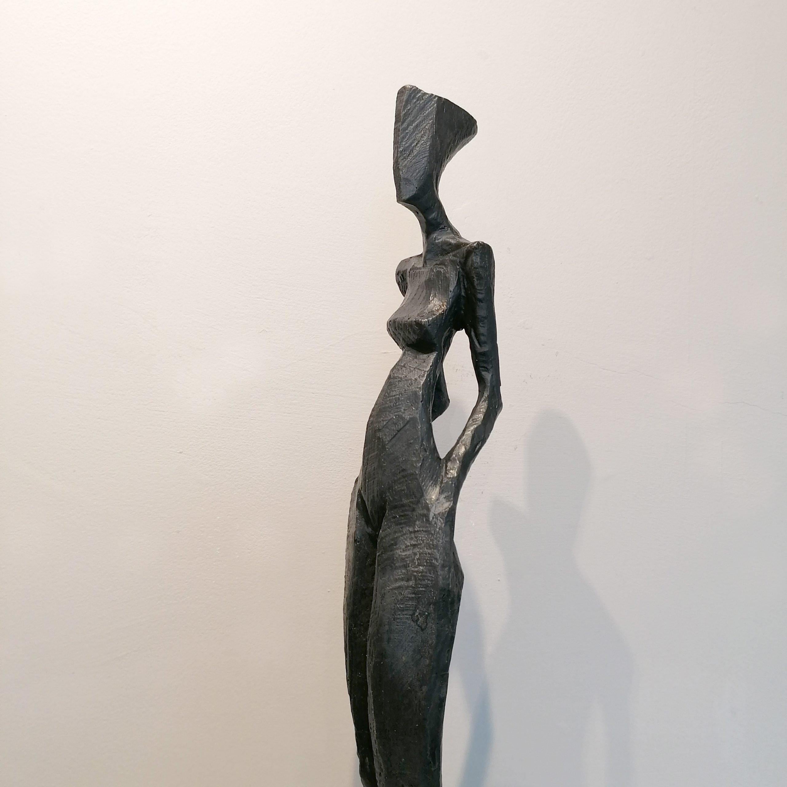 Patricia is an elegant figurative sculpture of the female form by Nando Kallweit.  Modelled on modern postures but with a nod to the importance of heritage through the stylised Egyptian-influenced head.

Nando carved the marque for the body from a