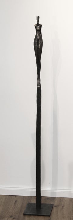 Patricia III by Nando Kallweit. Tall, elegant bronze sculpture of human figure.