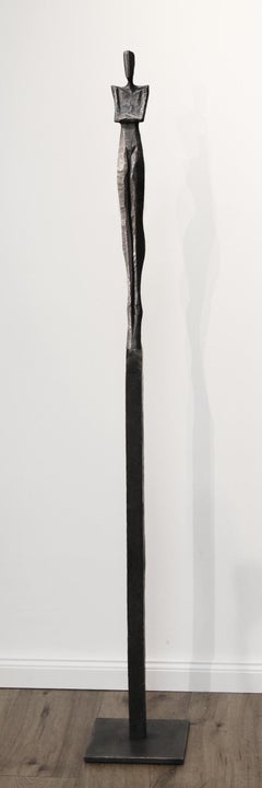 Paul III by Nando Kallweit. Tall, elegant bronze sculpture of human figure.