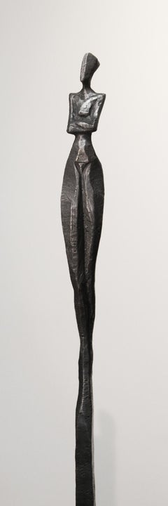 Rosalie III by Nando Kallweit. Tall, elegant bronze sculpture of human figure.