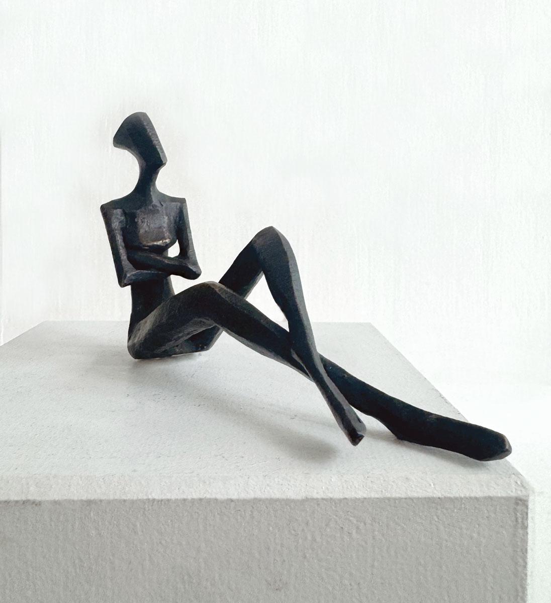 Scarlett. By Nando Kallweit. Elegant bronze figurative sculpture of a male.