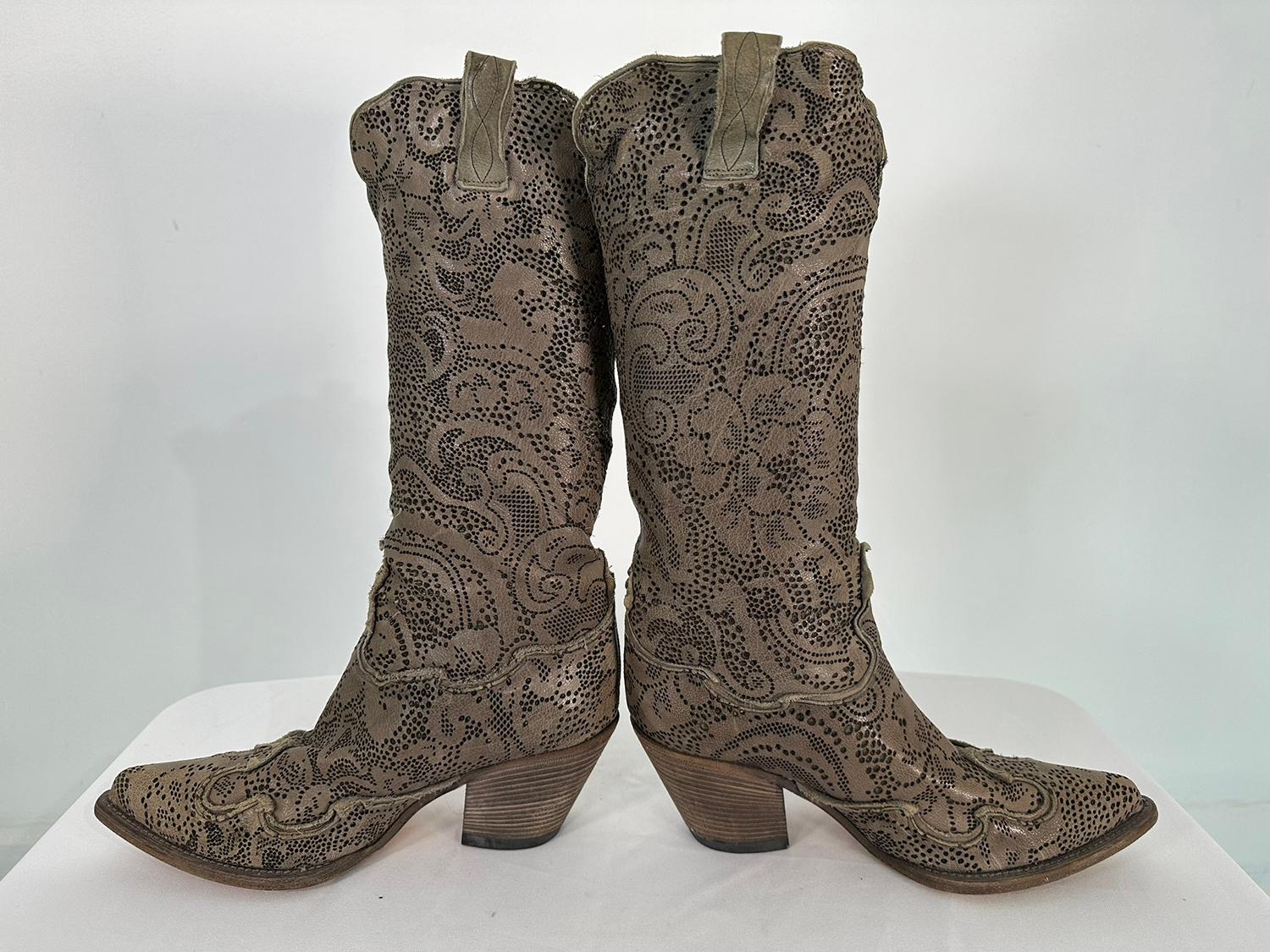 Nando Mucci grey floral lacy leather laser cut cowboy boots 39. Cowboy boots with a romantic twist, pale grey laser cut leather boots with a scrolling lacey design. Pointed toes, under slung chunky heels & scalloped tops. The boots are about 13