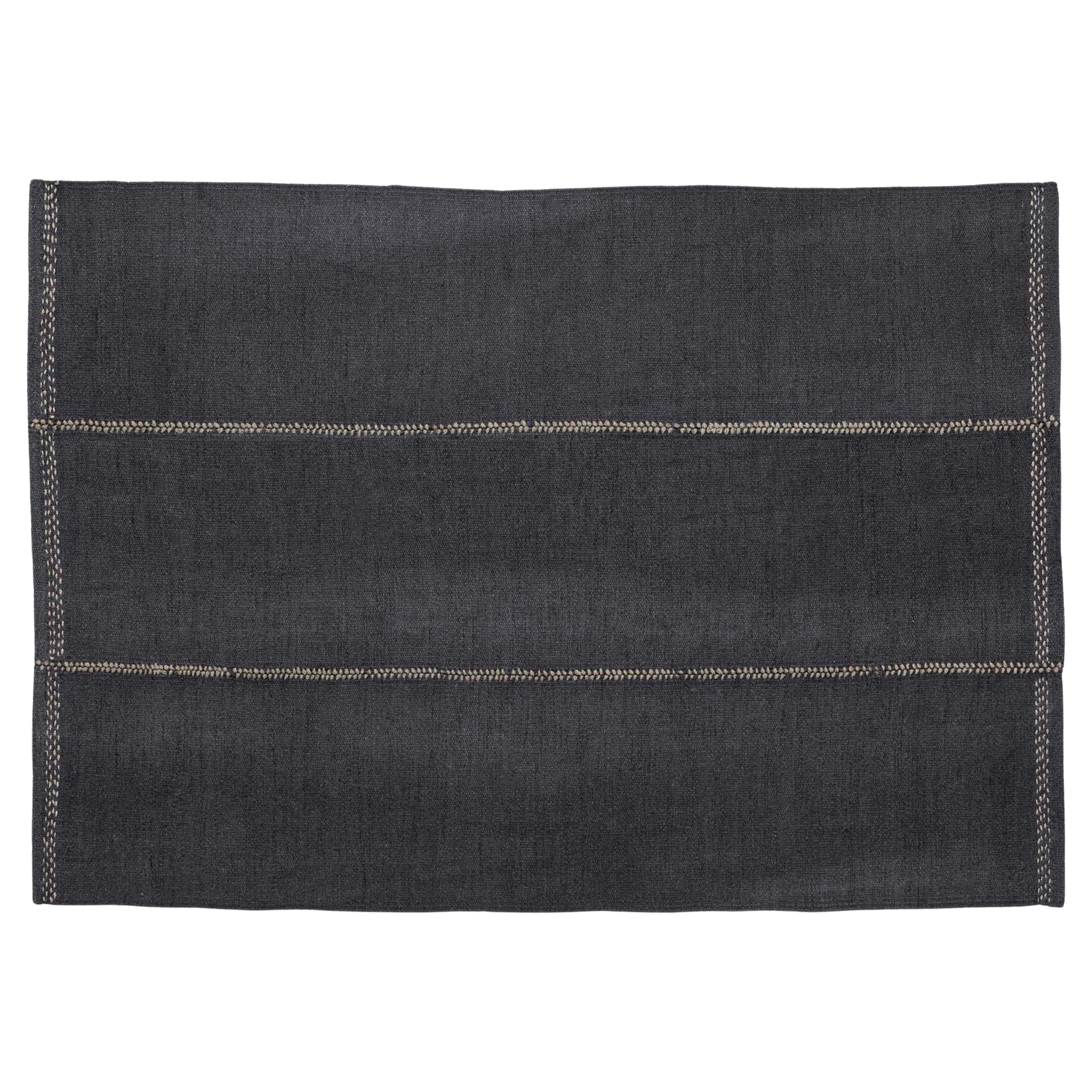 Nani Marquina Mía Rug in 
Navy
 with Dashed Stitching in Beige 170x240 cm