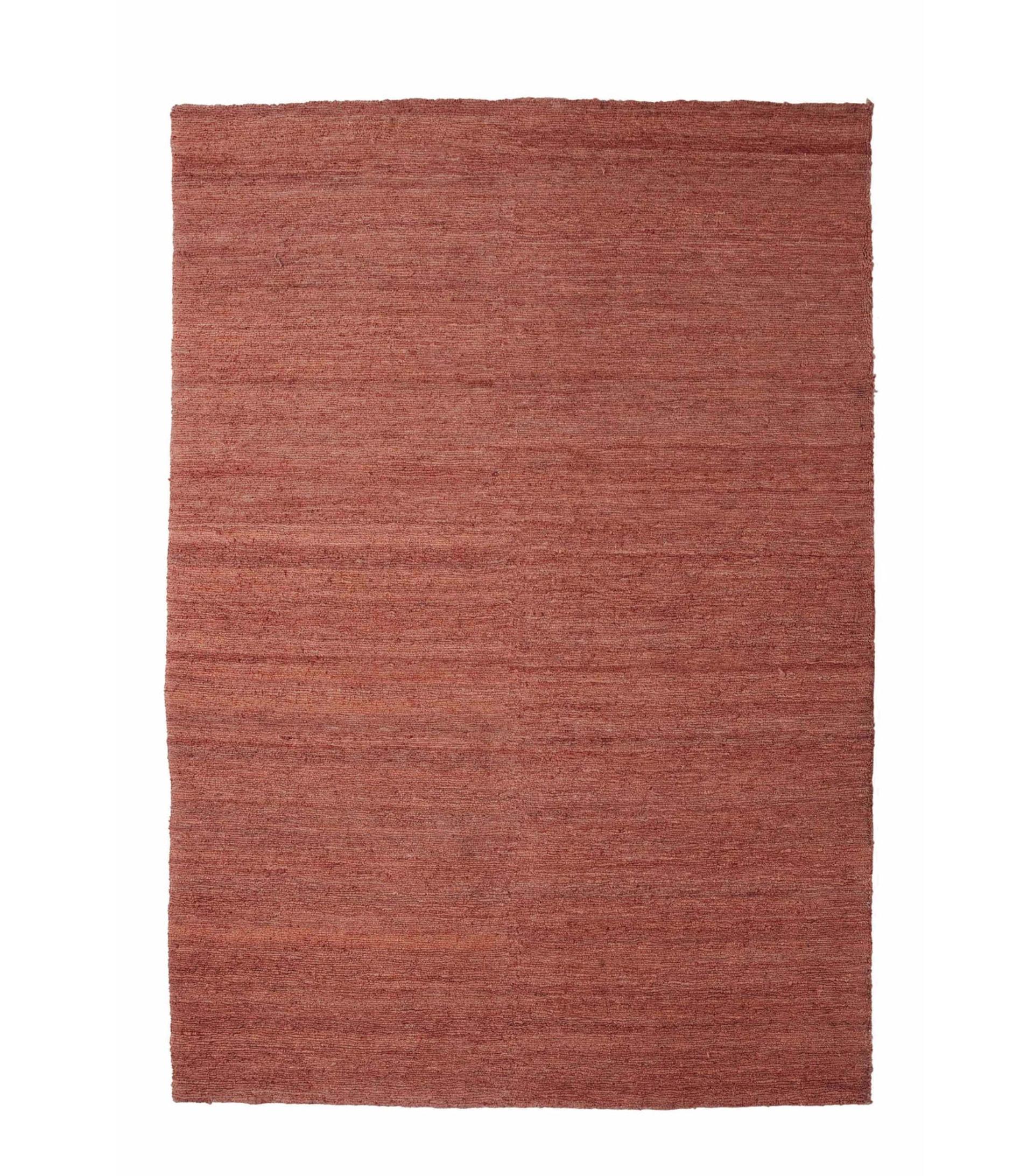 Nanimarquina 'Earth' Rug in Hand Spun Jute. New, current production.

This handmade jute rug evokes the textures of Earth. Hand-knotted with tight loops, Earth is a very cool, rustic rug. The terracotta or 
