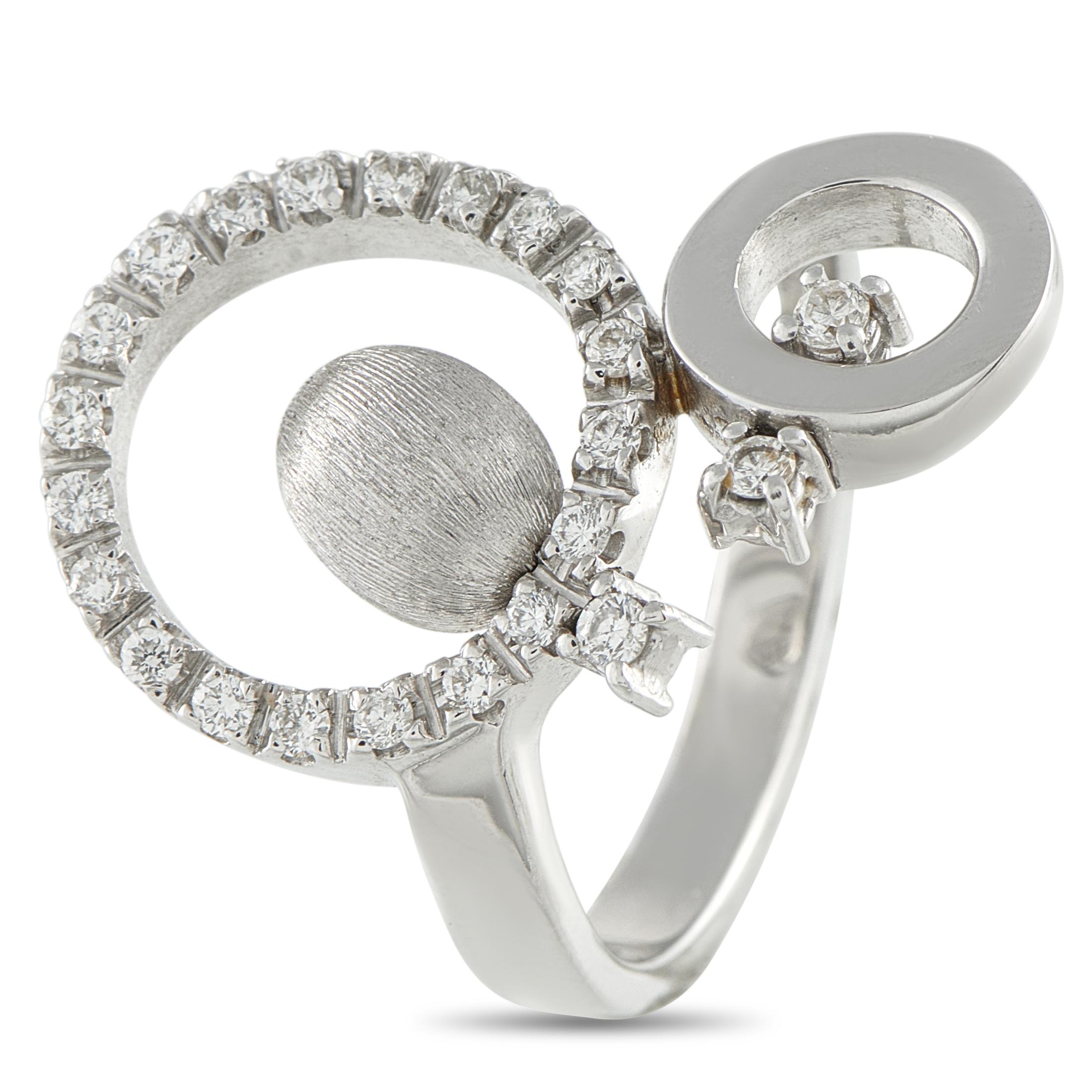 Circular forms make this Nanis ring bold and incredibly contemporary. The unique 18K White Gold setting comes to life thanks to textured accents and openwork design elements. Diamonds with a total weight of 0.45 carats make it even more impressive.
