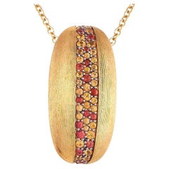Nanis Halskette mit Anhänger, 18 Karat Gelbgold, 2,00 Karat Saphir