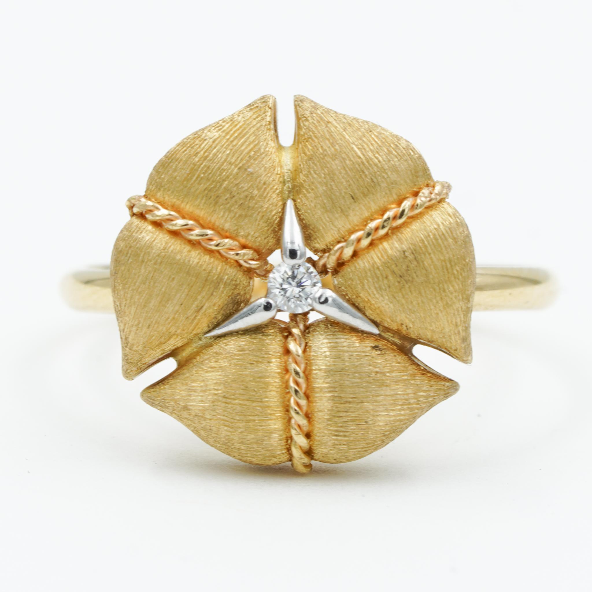 This luxurious Diamond Amarcord Ring by Nanis was handcrafted in 18k yellow gold and made beautifully with precise details. It perfectly combines an elegant and timeless style with subtle details as well as the signature brushed finish. The ring