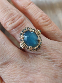 Nanis Reverse double-face ring with blue diamonds and topaz