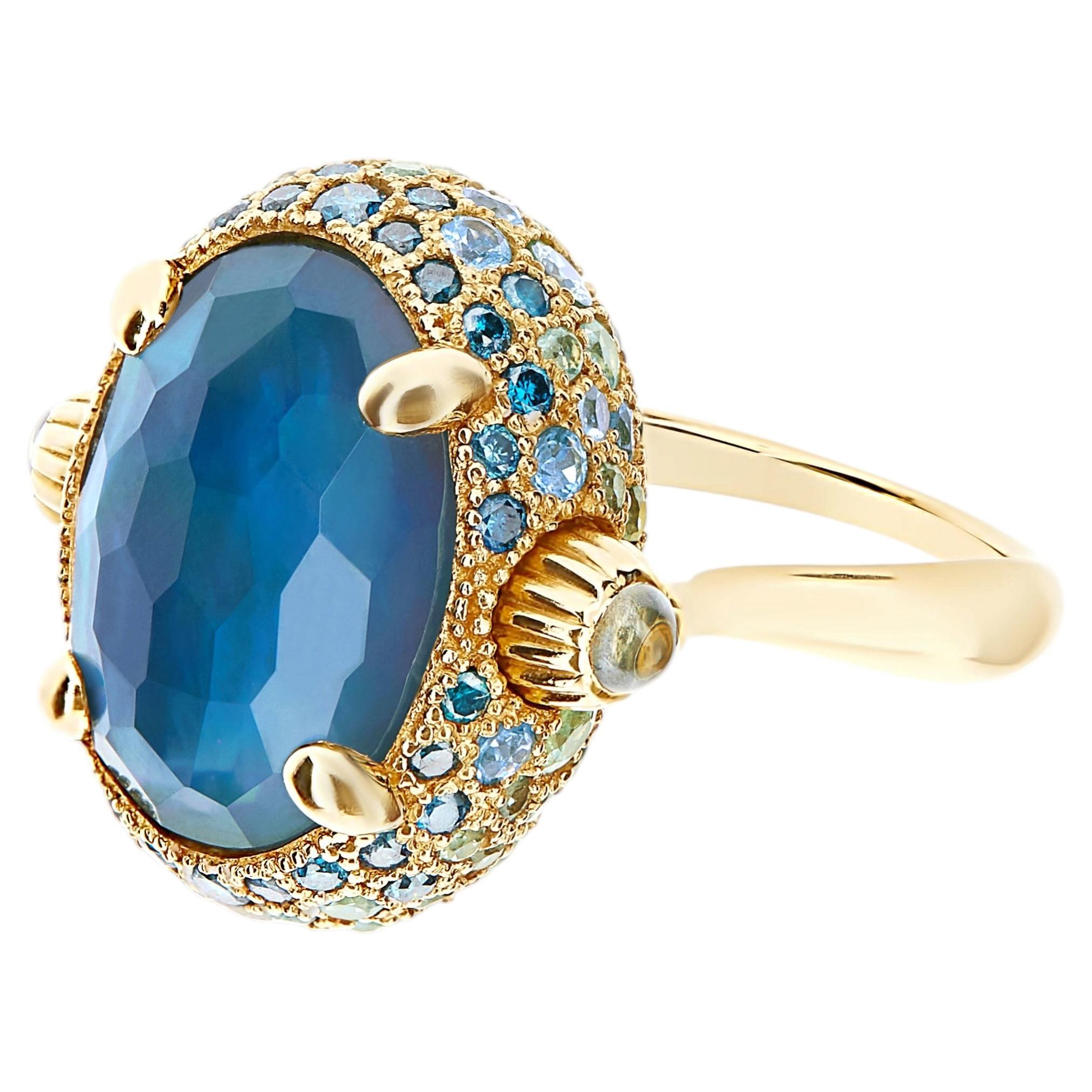 Nanis Reverse double-face ring with blue diamonds and topaz